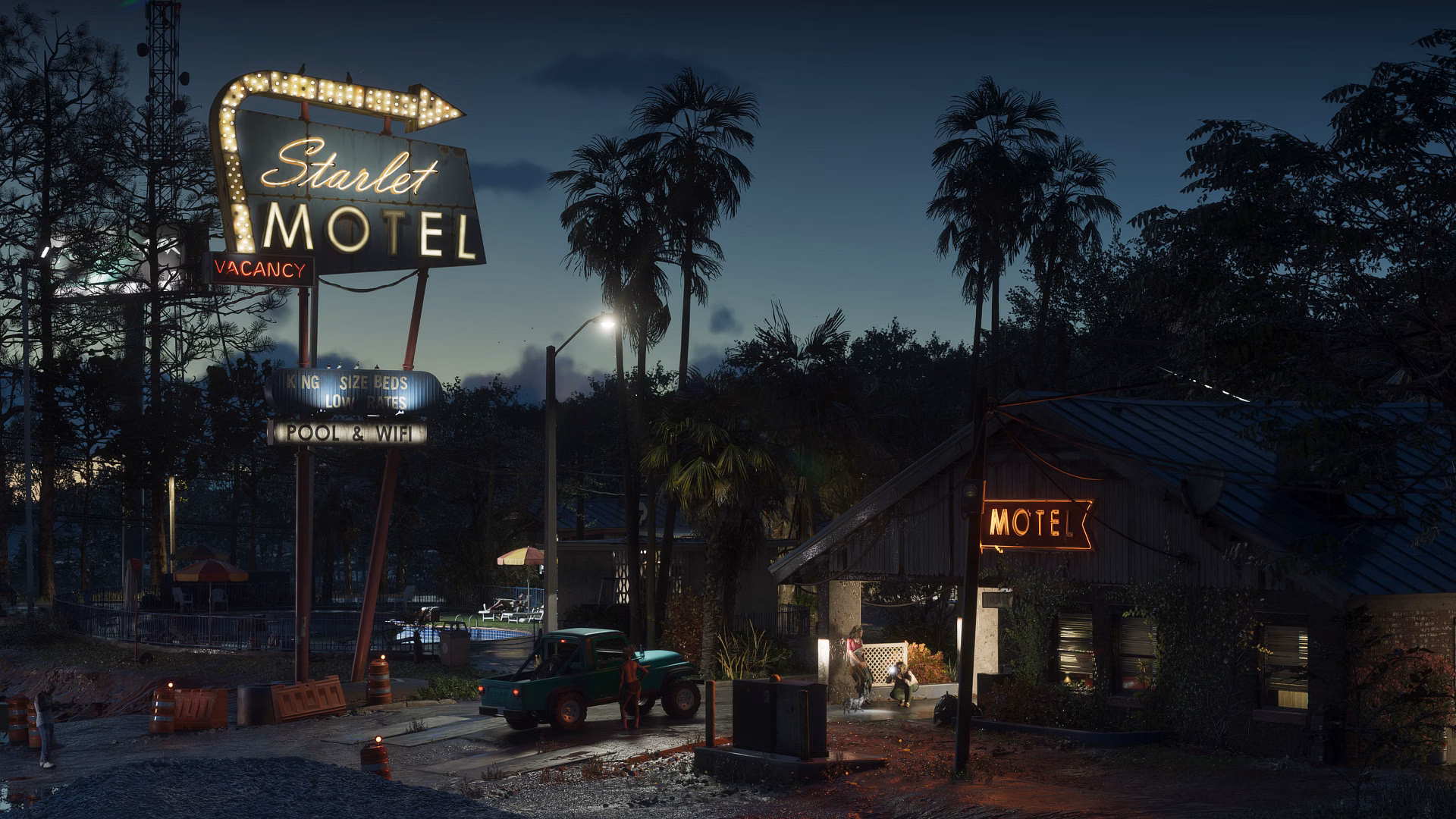 Roadside motels and palm trees in Port Gellhorn at night